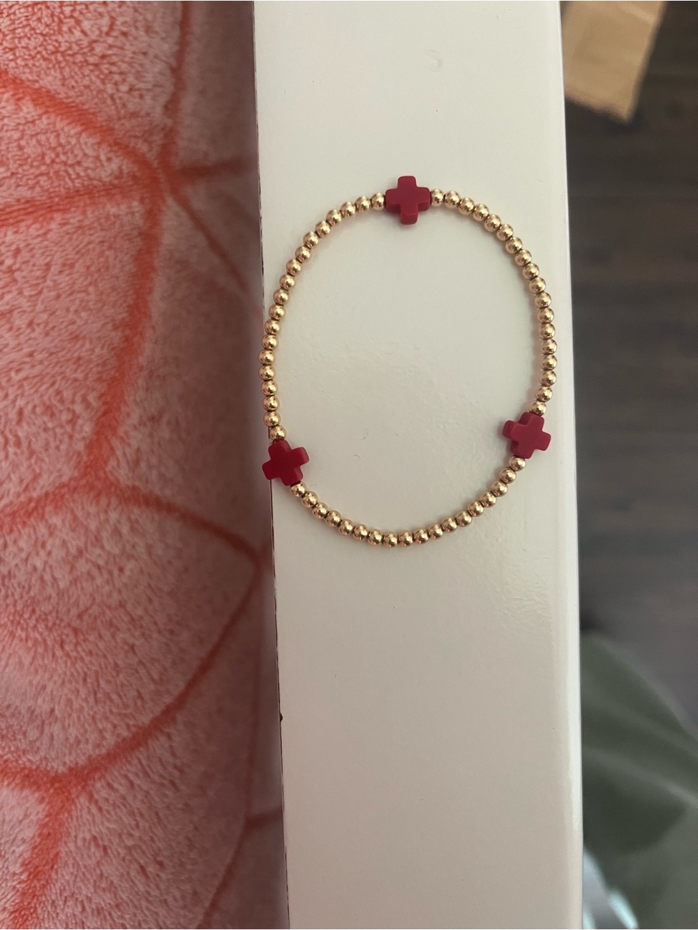 Gold Beaded Bracelet with Red Cross Accent enewton